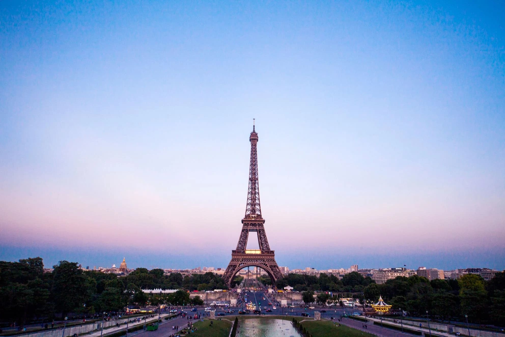 Eiffel Tower at sunset overlooking the Seine River and Paris skyline